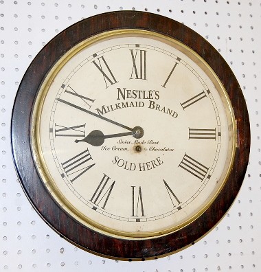 Nestle's Milkmaid Brand Advertising Gallery Clock — Antique Clocks Price Guide