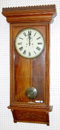 Carved Oak Waterbury No. 67 2 Wt. Antique Clock — Antique Clocks Price Guide
