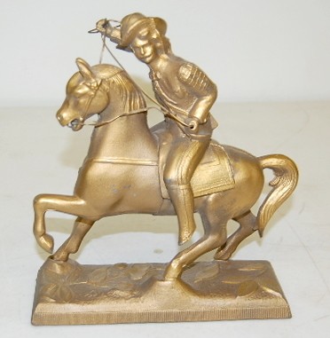 Buffalo Bill Metal Clock Statue — Antique Clocks Price Guide