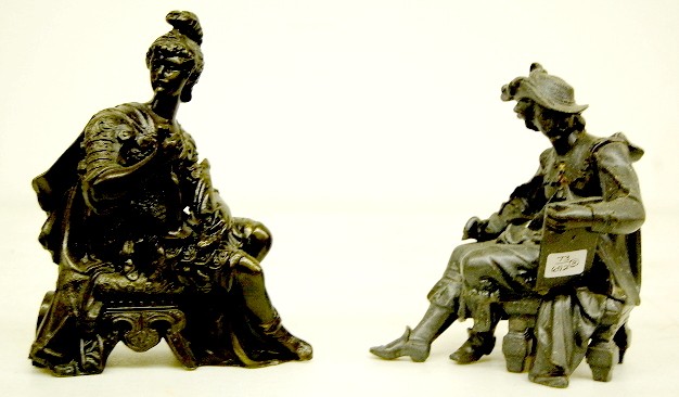 2 Seated Male Metal Clock Statues — Antique Clocks Price Guide
