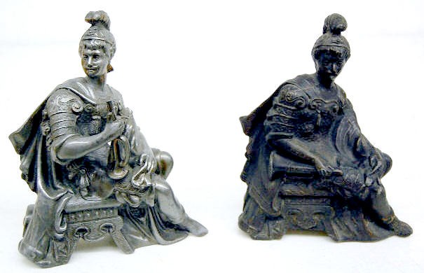 2 Seated Male Warrior Metal Clock Statues — Antique Clocks Price Guide