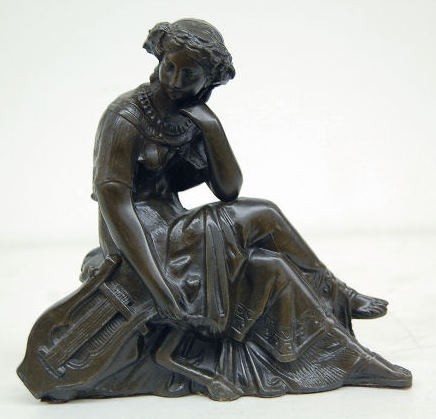 Seated Lady Metal Clock Statue — Antique Clocks Price Guide