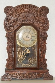 Sessions Oak Kitchen Clock W/ Dolphins — Antique Clocks Price Guide