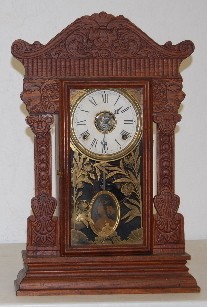 Gilbert Oak Kitchen Clock w/ Lion Heads — Antique Clocks Price Guide