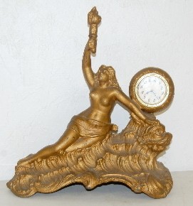 Antique Nude Lady and Dolphin Clock — Antique Clocks Price Guide