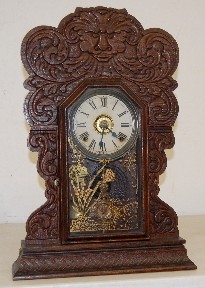 Antique Oak Face Carved Kitchen Clock w/ Alarm — Antique Clocks Price Guide