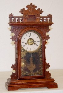 E.N. Welch Walnut "Pansy" Clock W/ Alarm — Antique Clocks Price Guide