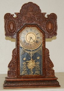 E. Ingraham Oak Kitchen Clock W/ Lions — Antique Clocks Price Guide