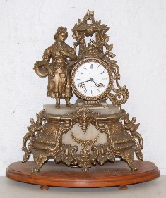 French Alabaster and Metal Figural Clock — Antique Clocks Price Guide
