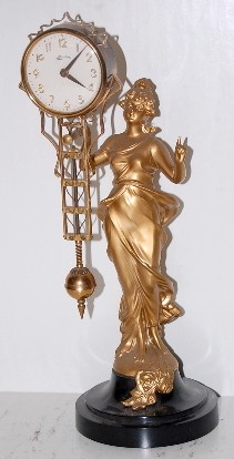 Lady Figural Swinging Clock, Linden — Antique Clocks Price Guide
