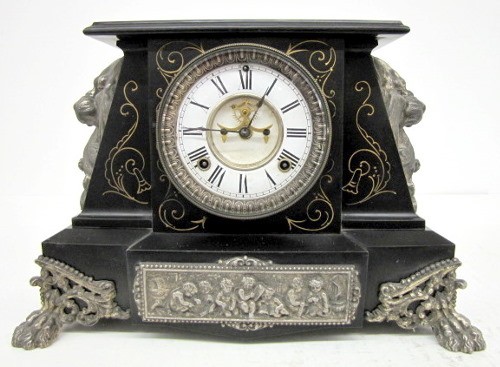 Ornate Ansonia "Nubia" Iron Case Clock W/ Cherubs — Antique Clocks Price Guide