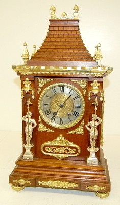 Lenzkirch Cabinet Clock W/ Knights and Fancy Trim — Antique Clocks Price Guide