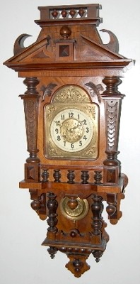 Antique Walnut Free Swinger Clock — Antique Clocks Price Guide