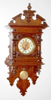 Ornate Antique Walnut Free Swinger Clock — Antique Clocks Price Guide