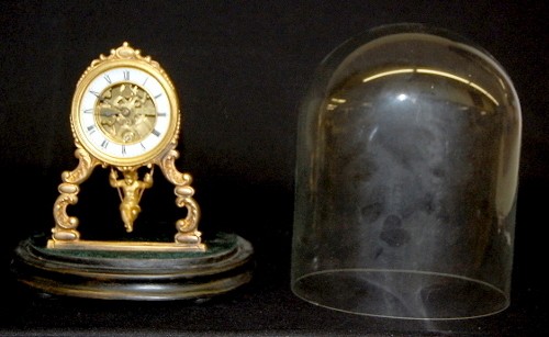 French Metal To and Fro Dome Clock W/ Cherub — Antique Clocks Price Guide