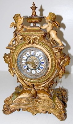 Ornate Ansonia "Lydia" Iron Clock W/ Cherubs — Antique Clocks Price Guide
