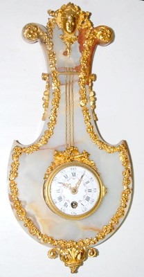 French Miniature Bronze and Onyx Wall Clock — Antique Clocks Price Guide