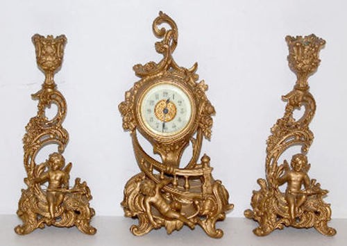 Ansonia "Silva" 3pc Miniature Cherubs Clock Set — Antique Clocks Price Guide