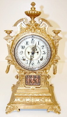 Ansonia "Emporia" Clock With Cherubs and Mask — Antique Clocks Price Guide