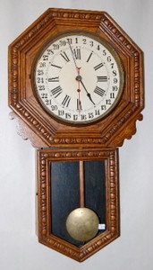 New Haven Oak Calendar Schoolhouse Clock — Antique Clocks Price Guide