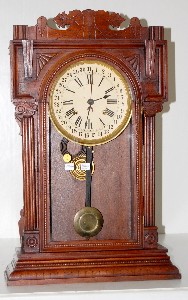Walnut Waterbury "Niagra" Calendar Clock — Antique Clocks Price Guide