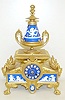 French Dore and Porcelain Cherub Decorated Clock