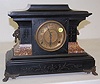 Enamel Marbleized Lion Head Mantle Clock