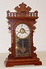 E.N. Welch Walnut "Pansy" Clock W/ Alarm