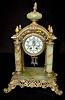 Gilbert Onyx and Ornate Metal 4 Column Clock