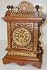 Ansonia Cabinet "F" Clock, Oak W/ Metal Trim