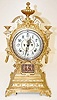 Ansonia "Emporia" Clock With Cherubs and Mask