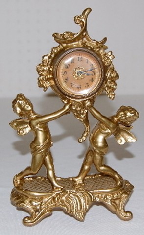 Gilbert Metal Novelty Cherub Figural Clock — Antique Clocks Price Guide