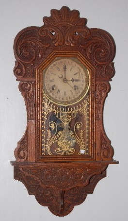 Am. Mfg. Oak "The Prophet" Calendar Wall Clock — Antique Clocks Price Guide