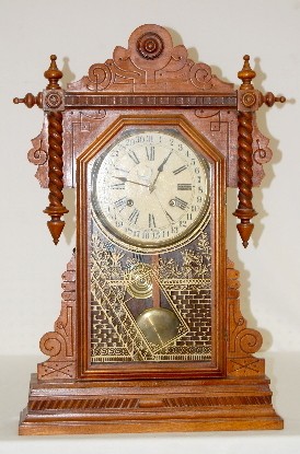 Waterbury Walnut "Buffalo" Calendar Clock — Antique Clocks Price Guide