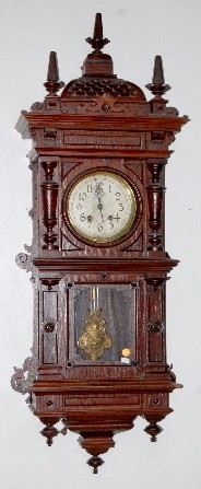 Lenzkirch Carved RA Style Wall Clock — Antique Clocks Price Guide