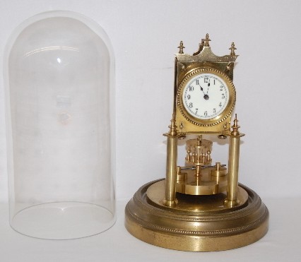Disk Pendulum Anniversary Dome Clock — Antique Clocks Price Guide