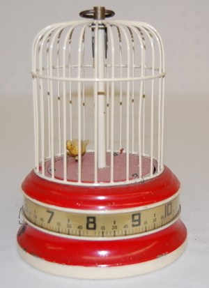 U.S.A. Tape Measure Animated Bird Clock — Antique Clocks Price Guide