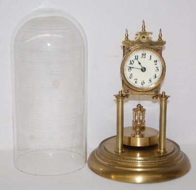 Urania Germany Disk Pendulum Dome Clock — Antique Clocks Price Guide