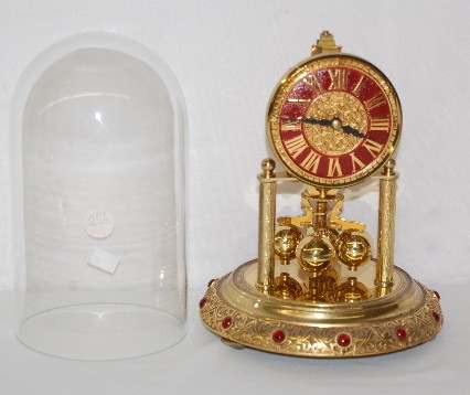 Kern Rotating Ball Pendulum Dome Clock — Antique Clocks Price Guide