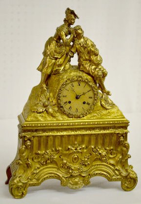 Bacilier and Fils Paris Mantel Clock w/Man &amp; Woman — Antique Clocks Price Guide