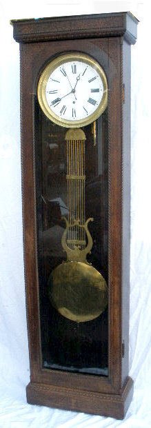 Oak Jewelers Pinwheel Regulator Clock — Antique Clocks Price Guide