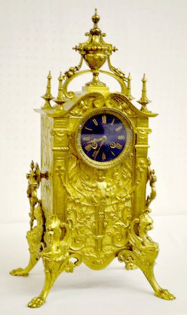 Vincenti Brass Mantel Clock, Angels &amp; Griffins — Antique Clocks Price Guide