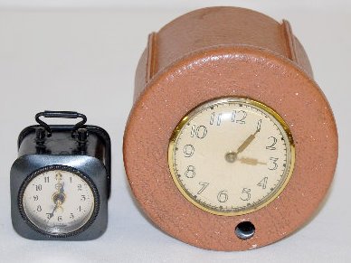 2 Clocks; German Alarm &amp; Lux Cigarette Dispenser — Antique Clocks Price Guide