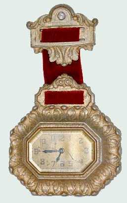 DeLuxe Watch Fob Style Novelty Clock — Antique Clocks Price Guide