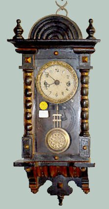 Miniature Carved RA Wall Clock — Antique Clocks Price Guide