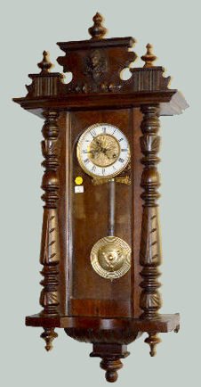 Carved Lady Head RA Wall Clock — Antique Clocks Price Guide
