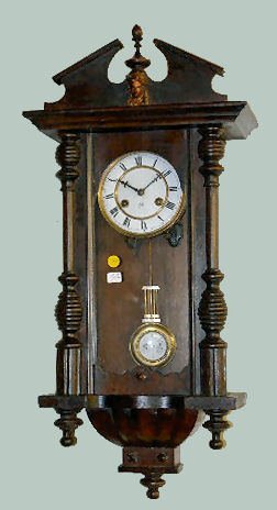 Junghans Carved Lady Head RA Clock — Antique Clocks Price Guide