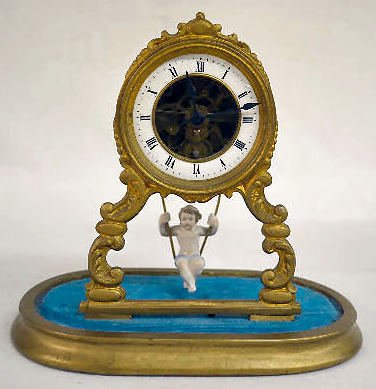 French Swinging To and Fro Doll Clock — Antique Clocks Price Guide