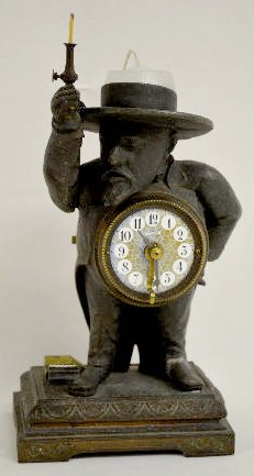 French Animated Statue Candle Clock w/Striker — Antique Clocks Price Guide