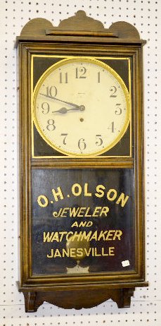 Waterbury "Pelican" Oak Advertising Wall Clock — Antique Clocks Price Guide